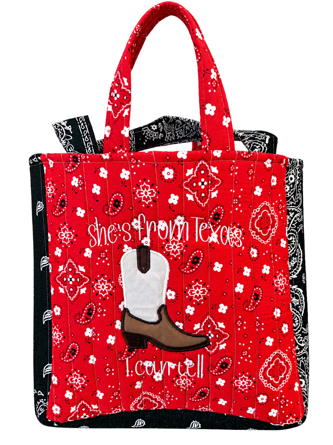 She's From Texas Sunset-size tote in red and black bandana fabric with cowboy boot appliqué and example name embroidery